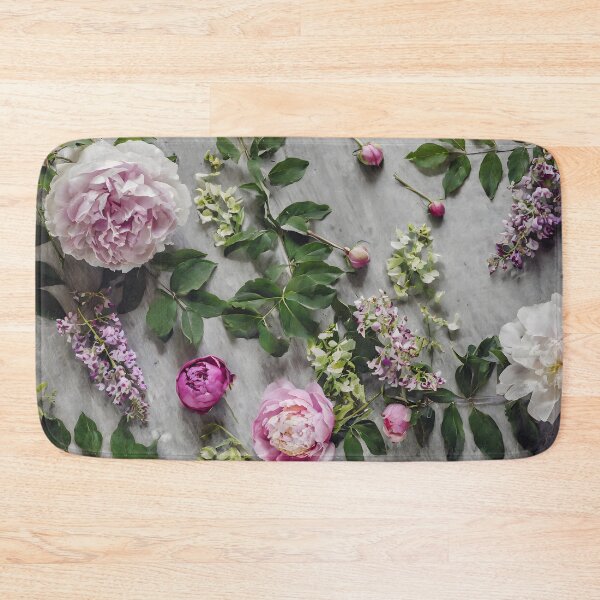 Item preview, Overhead view of a table with peonies, wisteria and green leaves. designed and sold by coffeeflavour.