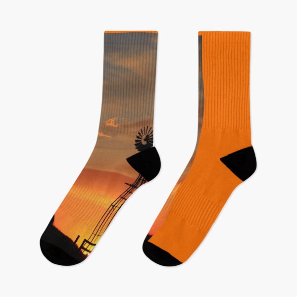 Item preview, Golden Sunset with a Windmill Silhouette with clouds designed and sold by ROBERTDBROZEK.