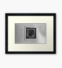Hand print in window Framed Print