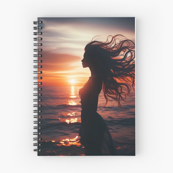 Item preview, Woman standing at the edge of the ocean, her hair flowing with the wind, at sunset designed and sold by AndreaMart.