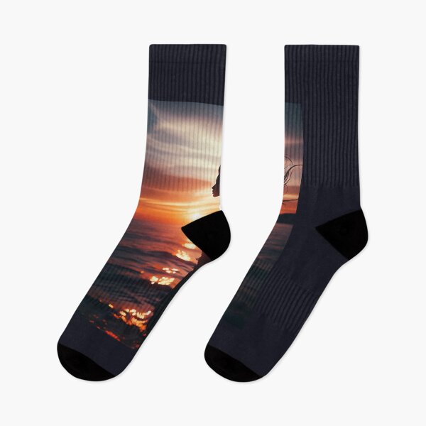 Item preview, Woman standing at the edge of the ocean, her hair flowing with the wind, at sunset designed and sold by AndreaMart.