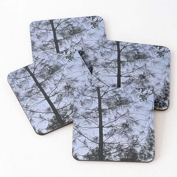 Item preview, Tree with sparse needles against blue sky designed and sold by ClaudiasCousin.
