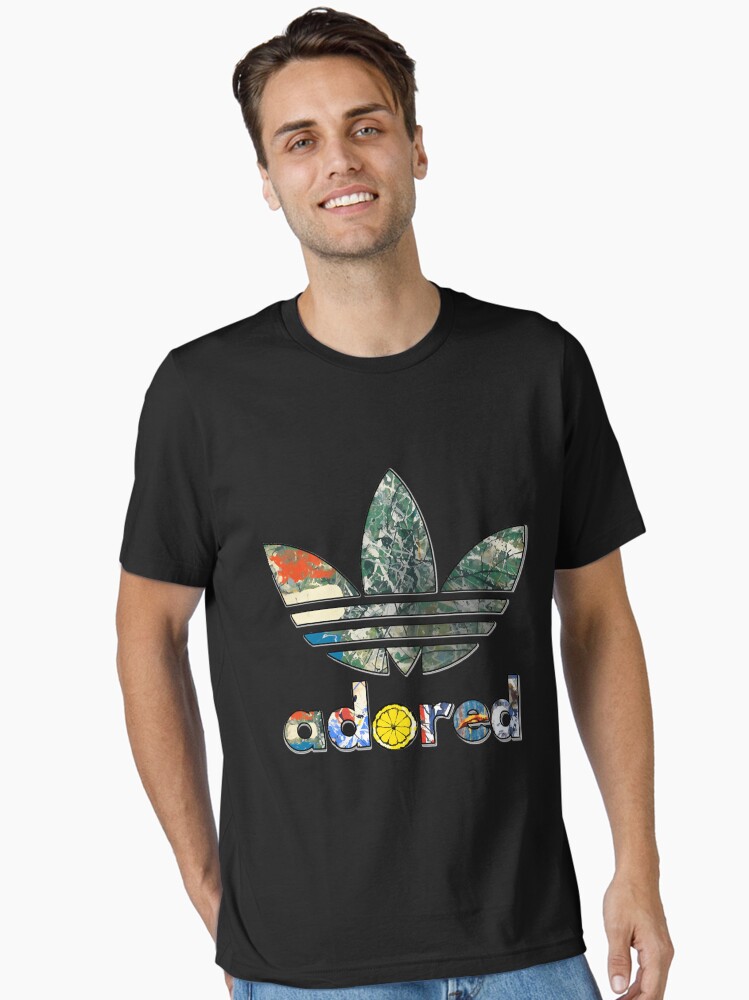 Thumbnail 1 of 7, Essential T-Shirt, Stone Roses Ian Brown Madchester Adored Manchester Sports designed and sold by ManonBesnard.