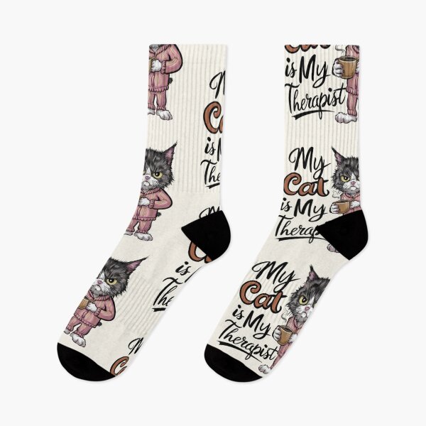 Item preview, My Cat Is My Therapist - A delightful and humorous vector illustration of a grumpy cat wearing cozy pajamas, holding a steaming coffee mug designed and sold by AdesignTEE.