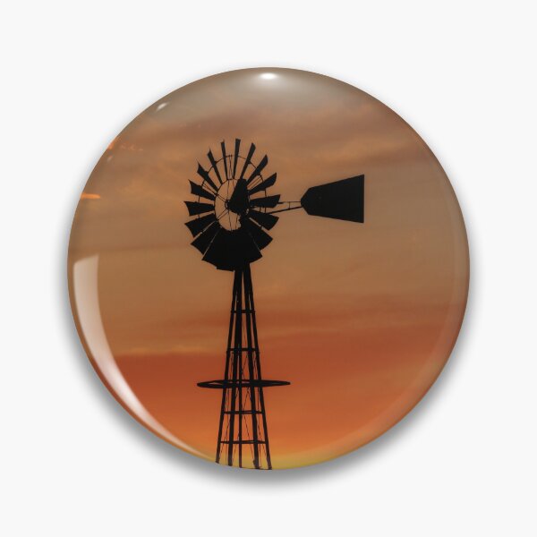 Item preview, Atardecer dorado con una silueta de molino de viento con nubes designed and sold by ROBERTDBROZEK.