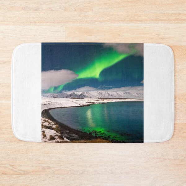 Item preview, Northern light in Iceland over Eyjafjordur fjord designed and sold by rogerstanger.