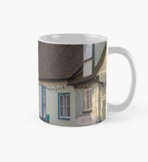 Multicoloured rickety old pubs, restaurants and shops Mug