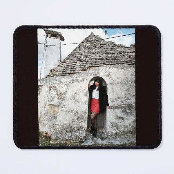 Item preview, Timeless Charm: Girl Posing in Front of a Trullo designed and sold by EpicVistas.