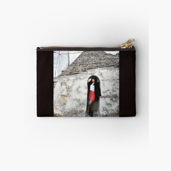 Item preview, Timeless Charm: Girl Posing in Front of a Trullo designed and sold by EpicVistas.