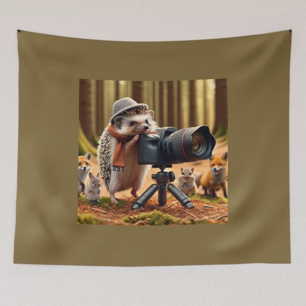 Item preview, Small hedgehog, dressed as a photographer with a tiny hat and a scarf around its neck designed and sold by AndreaMart.