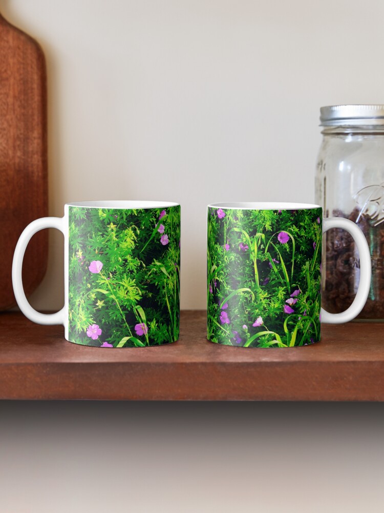 Thumbnail 2 of 6, Coffee Mug, Green Grass Summer Background with Little Lilac Flowers designed and sold by Mallorn.