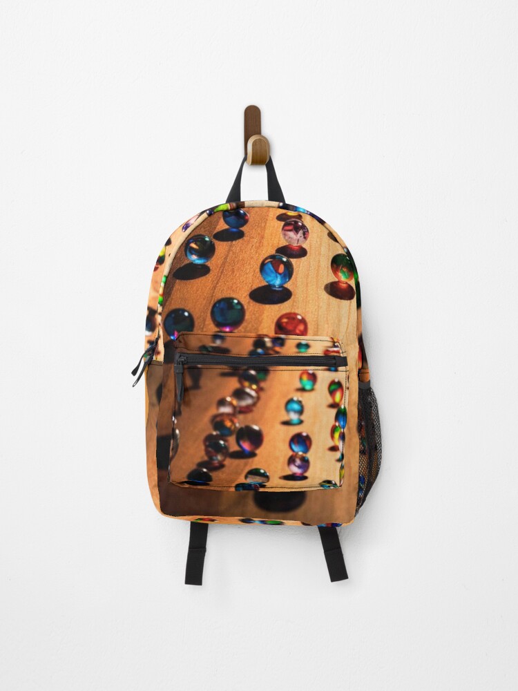 Thumbnail 1 of 3, Backpack, Colorful Marbles on a Table designed and sold by RWCarpenter.