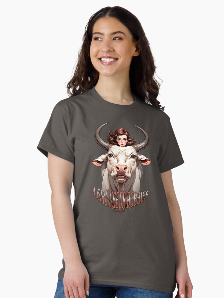 Thumbnail 1 of 7, Classic T-Shirt, A Girl Needs Hobbies Hotwife Bull rider White Bull  designed and sold by Vixen-Games.