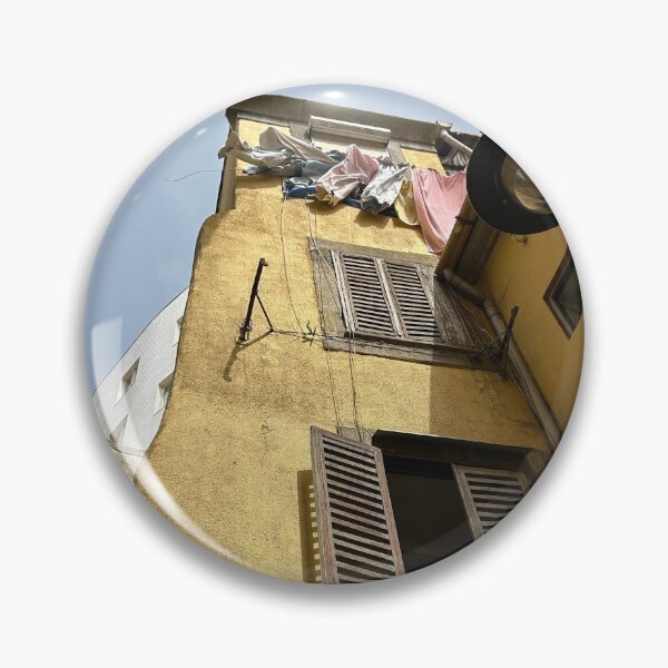 Item preview, yellow building in porto with clothes hanging to dry.  designed and sold by ninjapineapple.
