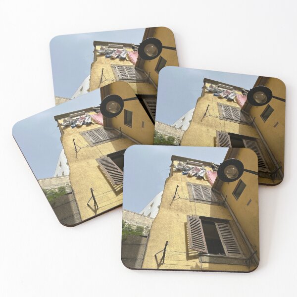 Item preview, yellow building in porto with clothes hanging to dry.  designed and sold by ninjapineapple.