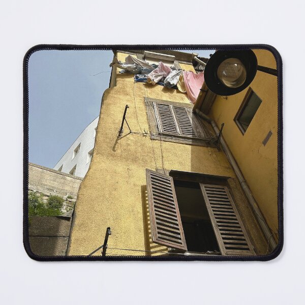 Item preview, yellow building in porto with clothes hanging to dry.  designed and sold by ninjapineapple.