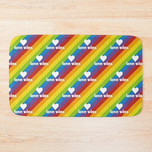 Item preview, diagonal rainbow stripes with white typo "love wins" designed and sold by colorofmagic.