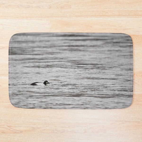 Item preview, Common goldeneye minimal on gray waters designed and sold by Jouko Lehto Photography.