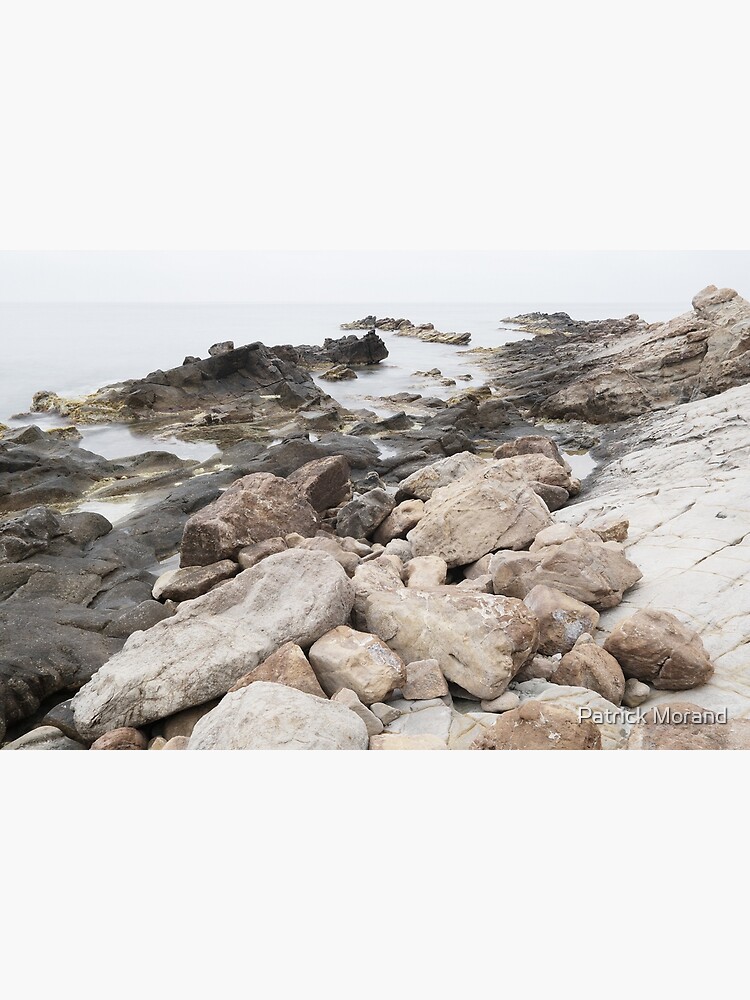 Thumbnail 3 of 3, Photographic Print, Some rocks on the beach designed and sold by patmo.