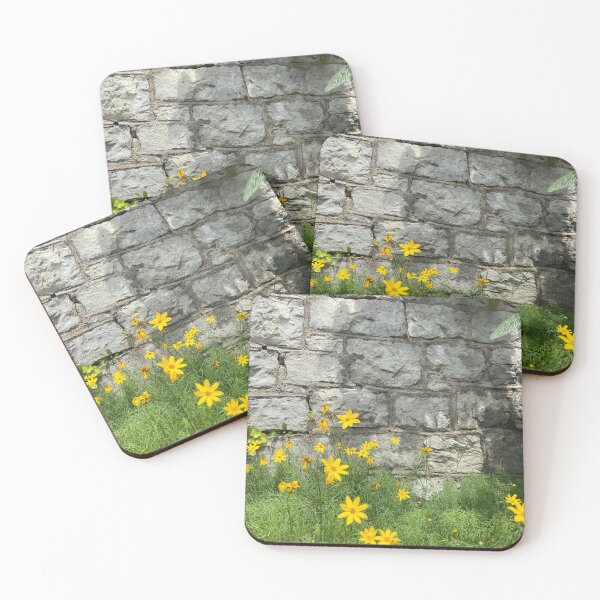 Item preview, Sunny yellow flowers near the foot of a stone wall . . . designed and sold by KolconBlue.