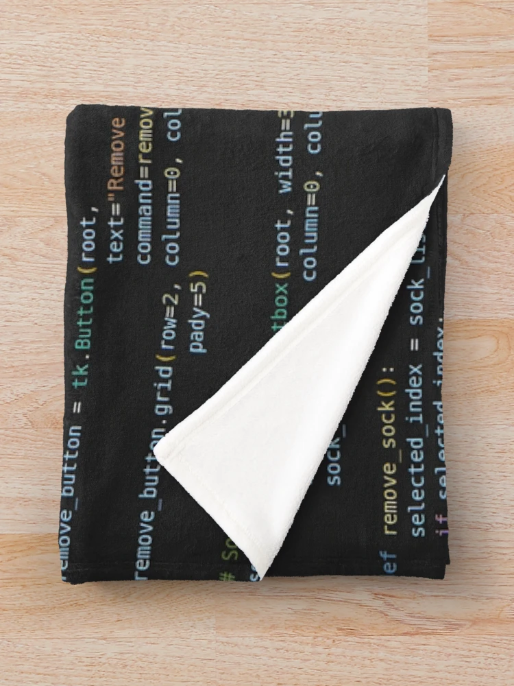 Aperçu 3 sur 6. Plaid avec l'œuvre Code de programme Python sombre créée et vendue par CodingSocks.