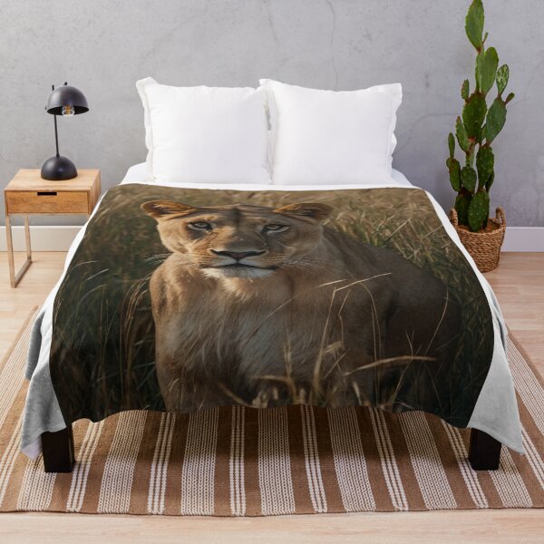 Item preview, A tense moment unfolds as a lioness emerges from the tall grass designed and sold by arjad3n.