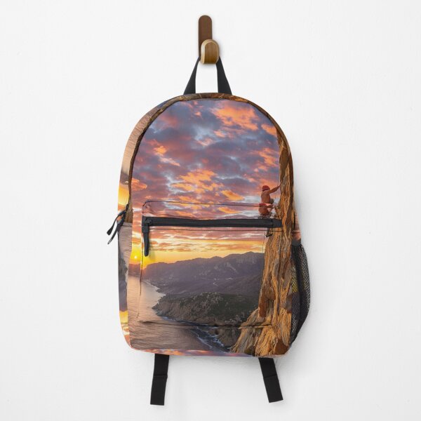Item preview, Climber ascending rocky cliff dramatic sunset Active Outdoors Inspired Art designed and sold by CDC40.