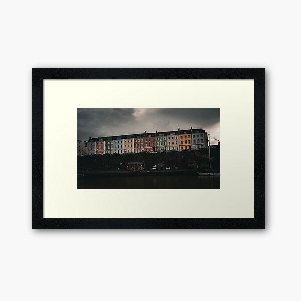 Item preview, Print of colourful houses on a stormy afternoon designed and sold by EmmaLLawson.