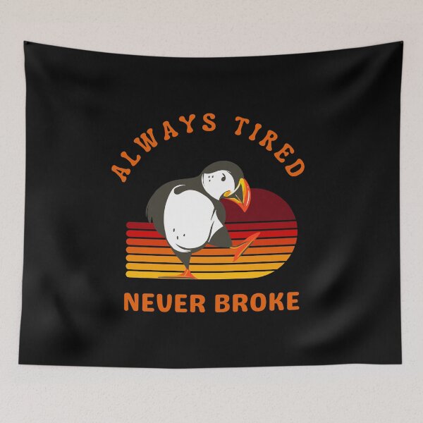 Item preview, ALWAYS TIRED NEVER BROKE FUNNY PUFFIN RETRO SUNSET designed and sold by BlueGoldArt.
