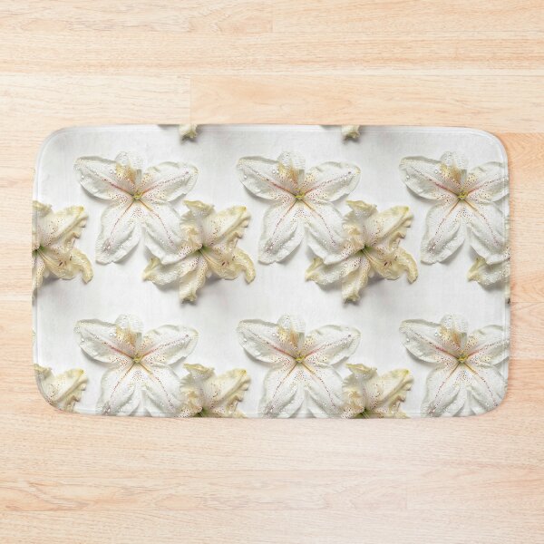 Item preview, An isolated shot of a single floral bloom with dew drops designed and sold by sample325.