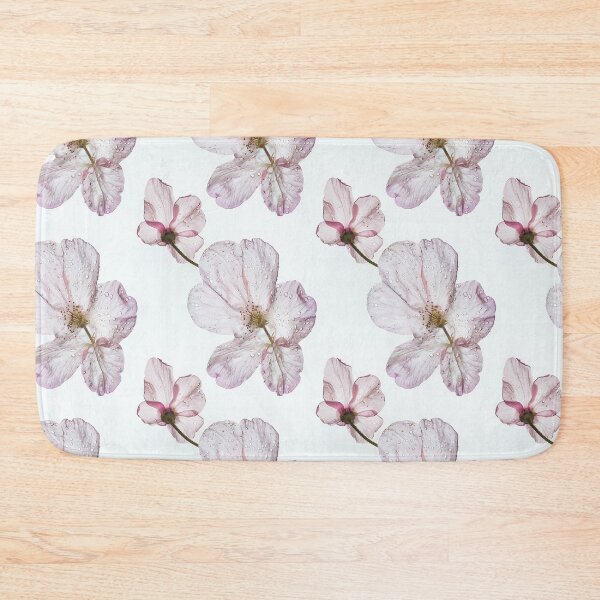 Item preview, An isolated shot of a single floral bloom with dew drops designed and sold by sample325.
