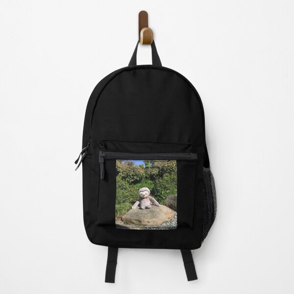 Item preview, Sloth plushie sitting on rock photograph designed and sold by vwagenet.