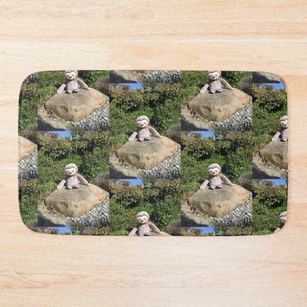 Item preview, Sloth plushie sitting on rock photograph designed and sold by vwagenet.