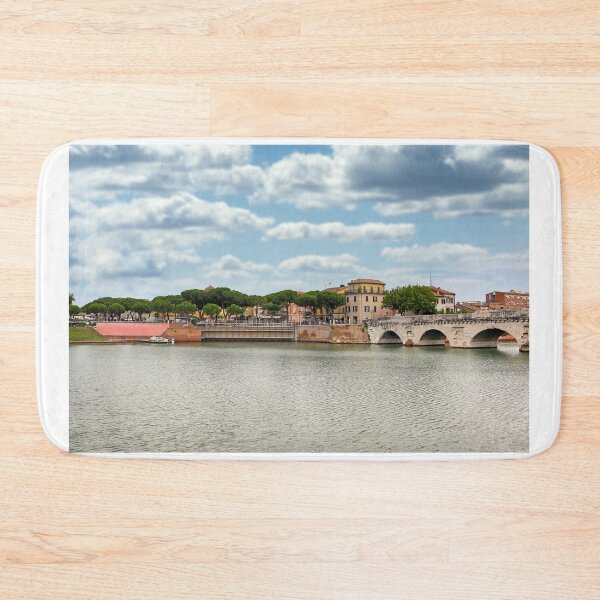Item preview, Ancient stone Tiberius bridge and old town buildings cityscape in Rimini Italy  designed and sold by goceris.