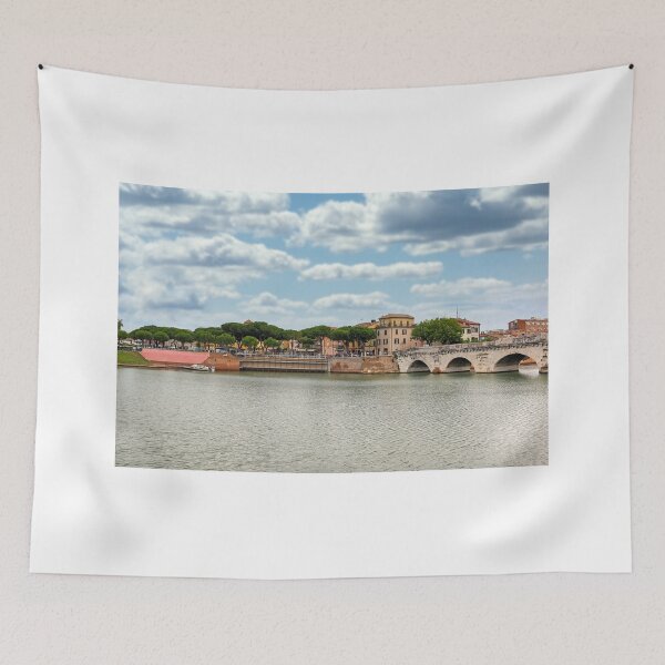 Item preview, Ancient stone Tiberius bridge and old town buildings cityscape in Rimini Italy  designed and sold by goceris.