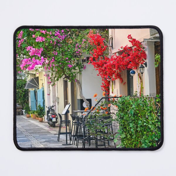 Item preview, Old houses in the narrow streets of Nafplion town with Bougainvillea flowers designed and sold by goceris.