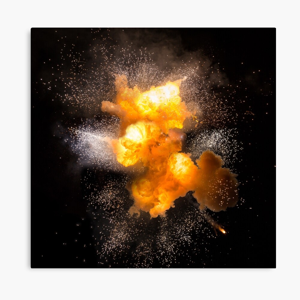 Realistic fiery explosion with sparks over a black background, high  resolution image