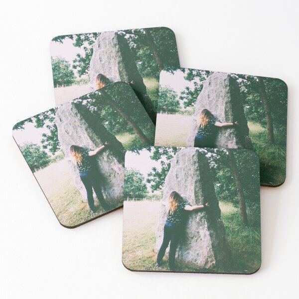 Item preview, Portrait photograph of a woman pressed against a menhir designed and sold by Carré Comme Orange.