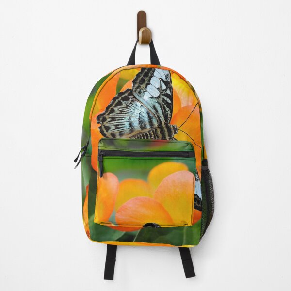 Item preview, A blue butterfly pollinating Rhododendron simbu sunset flowers designed and sold by Peter Etchells.