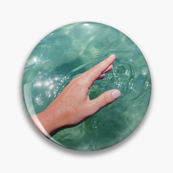 Item preview, Mano femenina estética tocando el agua de mar. designed and sold by FleurDesign.