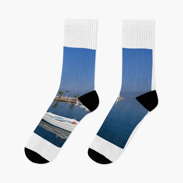 Item preview, White boats and blue sea in the harbor Nafplio Greece summer season designed and sold by goceris.