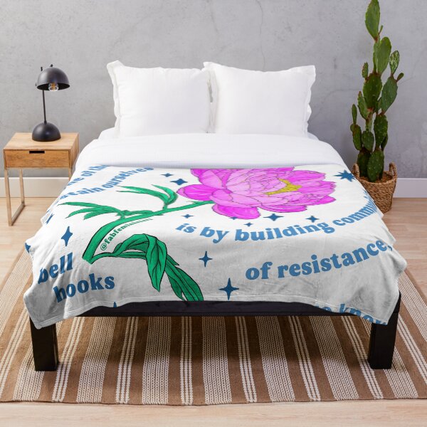 Item preview, "One of the most vital ways we sustain ourselves is by building communities of resistance, places where we know we are not alone." bell hooks designed and sold by fabfeminist.