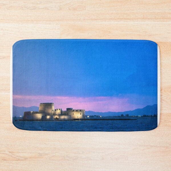Item preview, Sunset sky over Bourtzi water fortress in Nafplio, Peloponnese, Greece designed and sold by goceris.