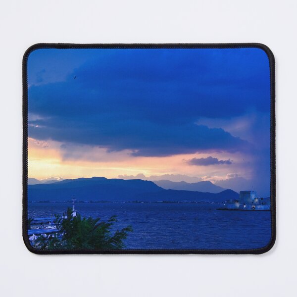 Item preview, Stormy sky and sunset over Bourtzi water fortress in Nafplio, Peloponnese, Greece designed and sold by goceris.