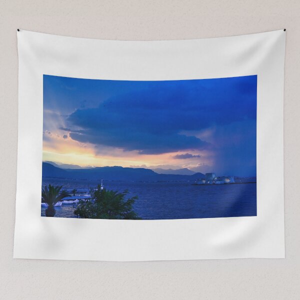 Item preview, Stormy sky and sunset over Bourtzi water fortress in Nafplio, Peloponnese, Greece designed and sold by goceris.