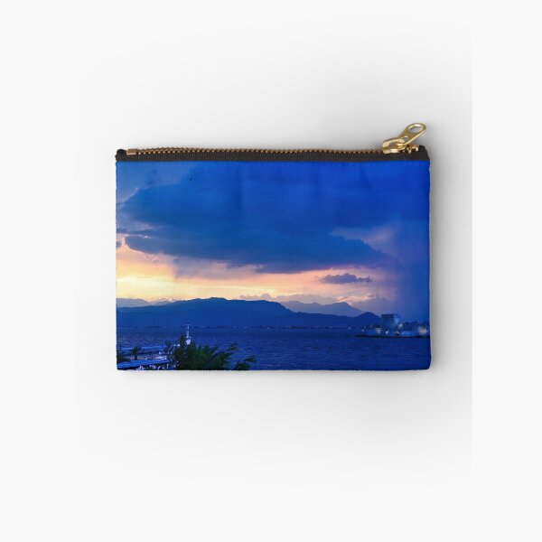Item preview, Stormy sky and sunset over Bourtzi water fortress in Nafplio, Peloponnese, Greece designed and sold by goceris.