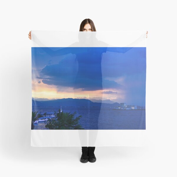 Item preview, Stormy sky and sunset over Bourtzi water fortress in Nafplio, Peloponnese, Greece designed and sold by goceris.