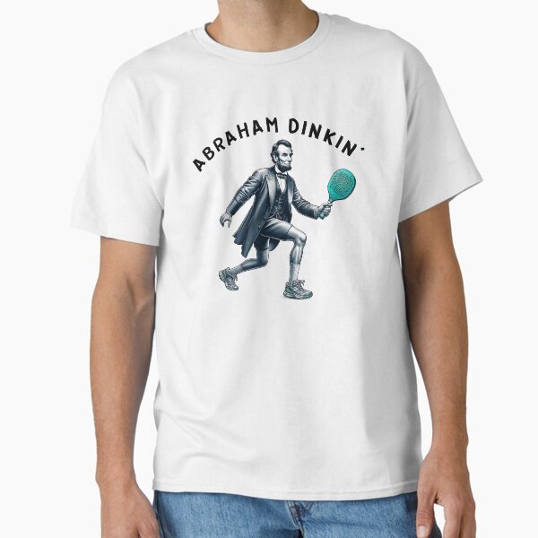 Vista previa del artículo con la obra «Abraham Dinkin' Lincoln Entusiasta del Pickleball », diseñado y vendido por The Junto Shop.
