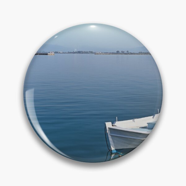 Item preview, Small fishing boat and Bourtzi fortress in Nafplio, Peloponnese, Greece designed and sold by goceris.