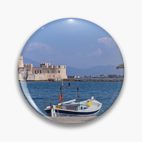 Item preview, Small fishing boat and Bourtzi water fortress in Nafplio, Peloponnese, Greece designed and sold by goceris.